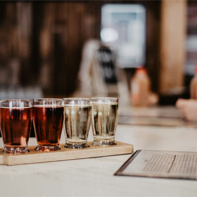 Branded coasters and tabletop accessories for bars