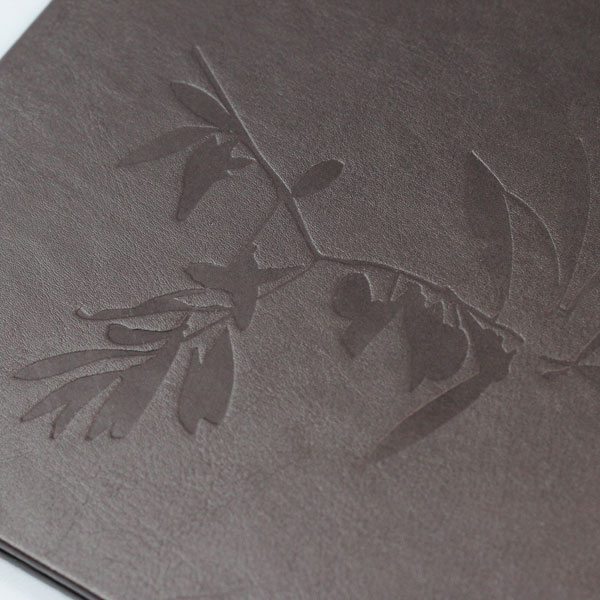 Debossing customization finish on hospitality products