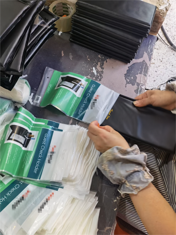 Packing custom hospitality presentation products in protective bags