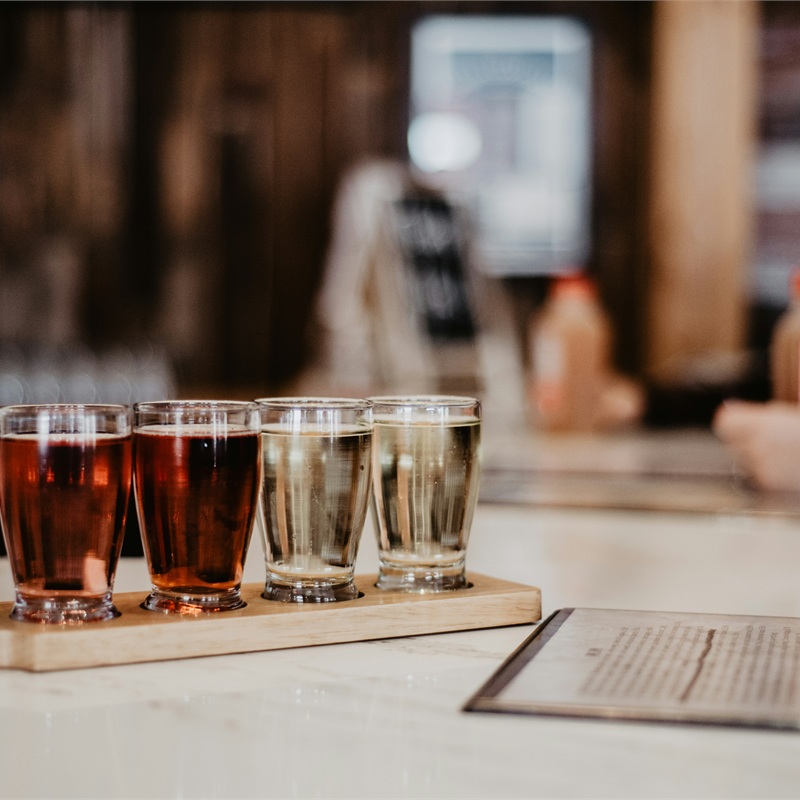 Branded coasters and tabletop accessories for bars