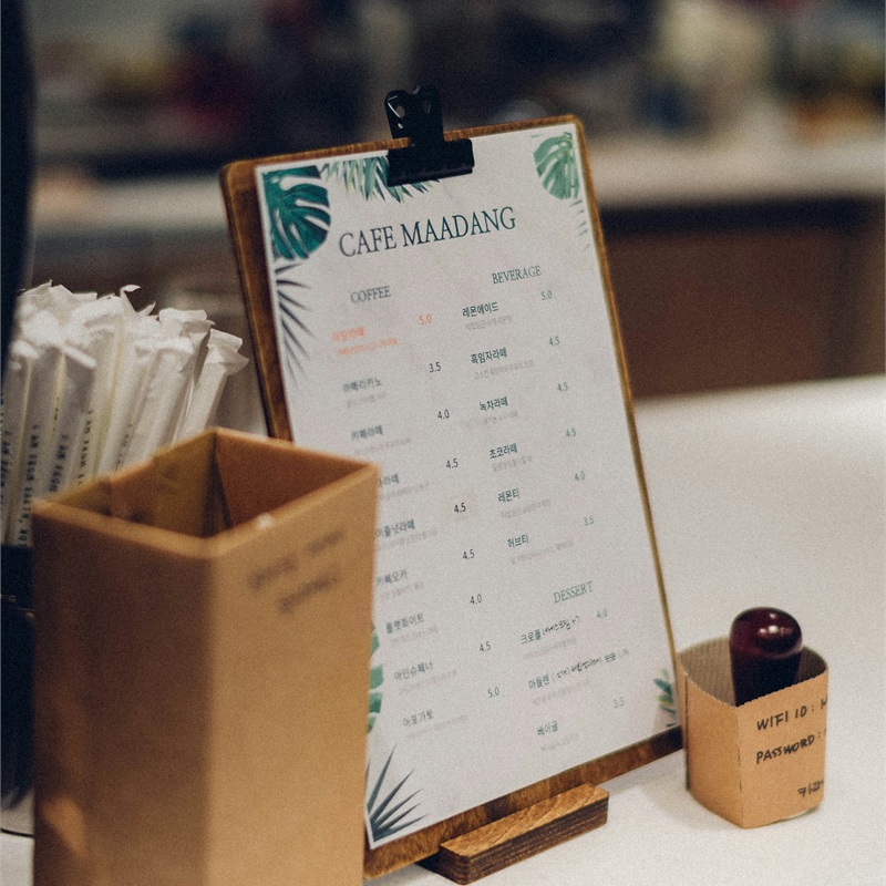 Restaurant table signage and menu holder display