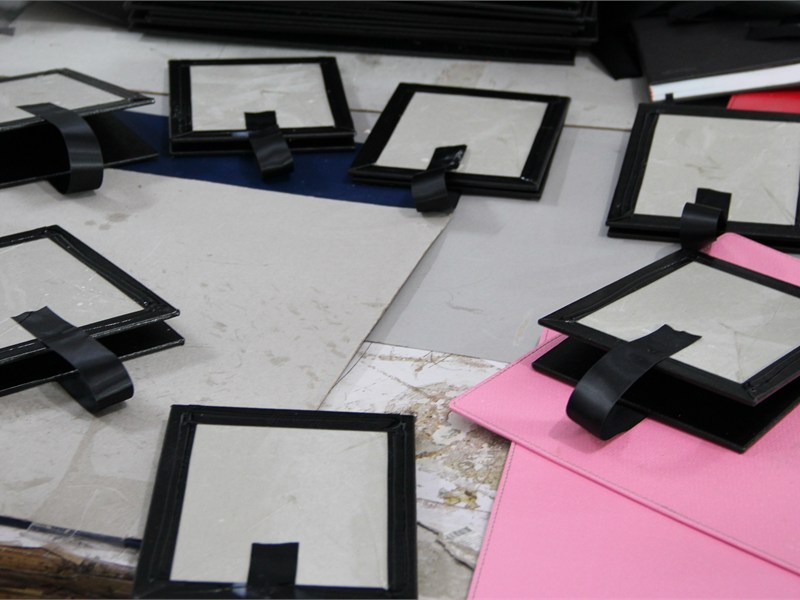 Half finished table tents during production