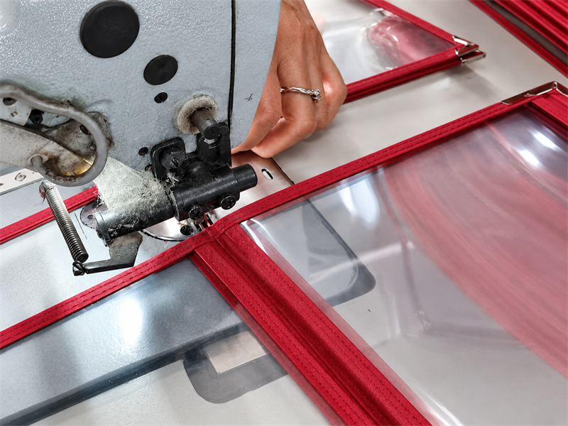 Sewing menu cover edges during production