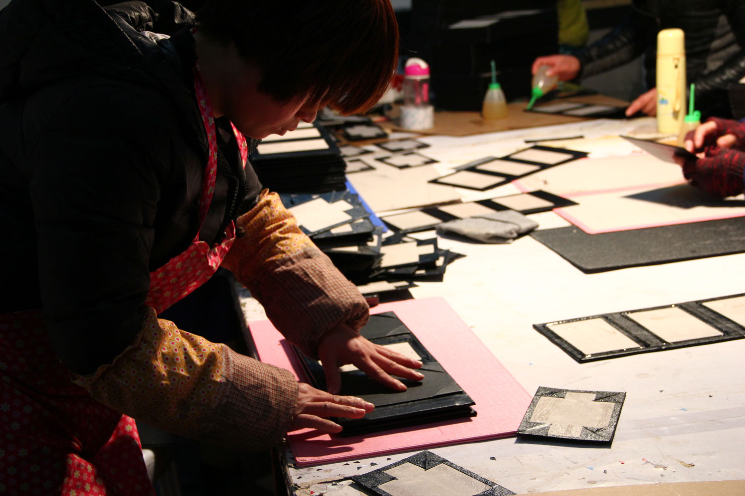 Menunique factory team assembling custom menu covers